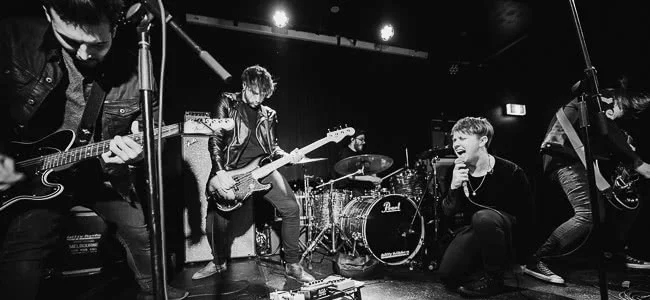 Nothing But Thieves playing live